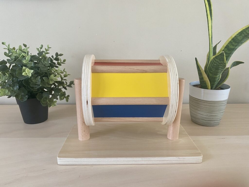 A colorful Montessori spinning drum